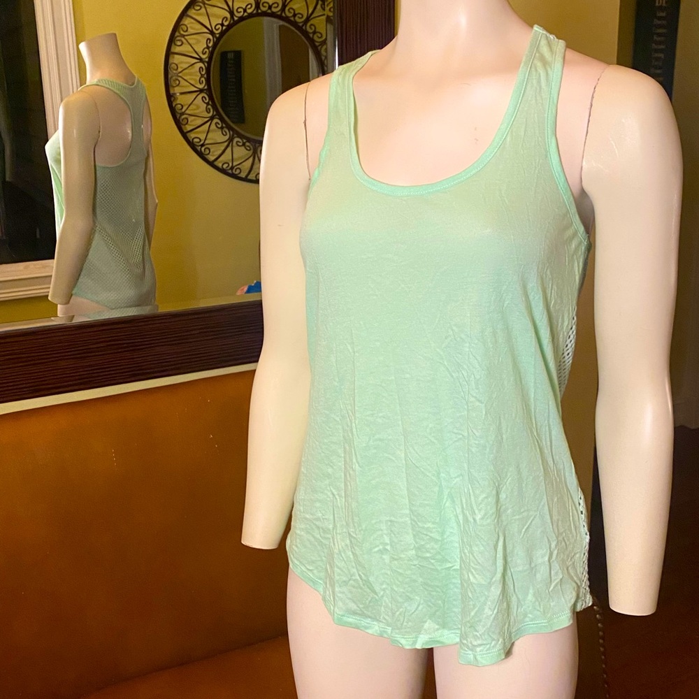 Express 💚 NWT celery green-cotton Tee shirt. Mesh racer style back. Brand new.
